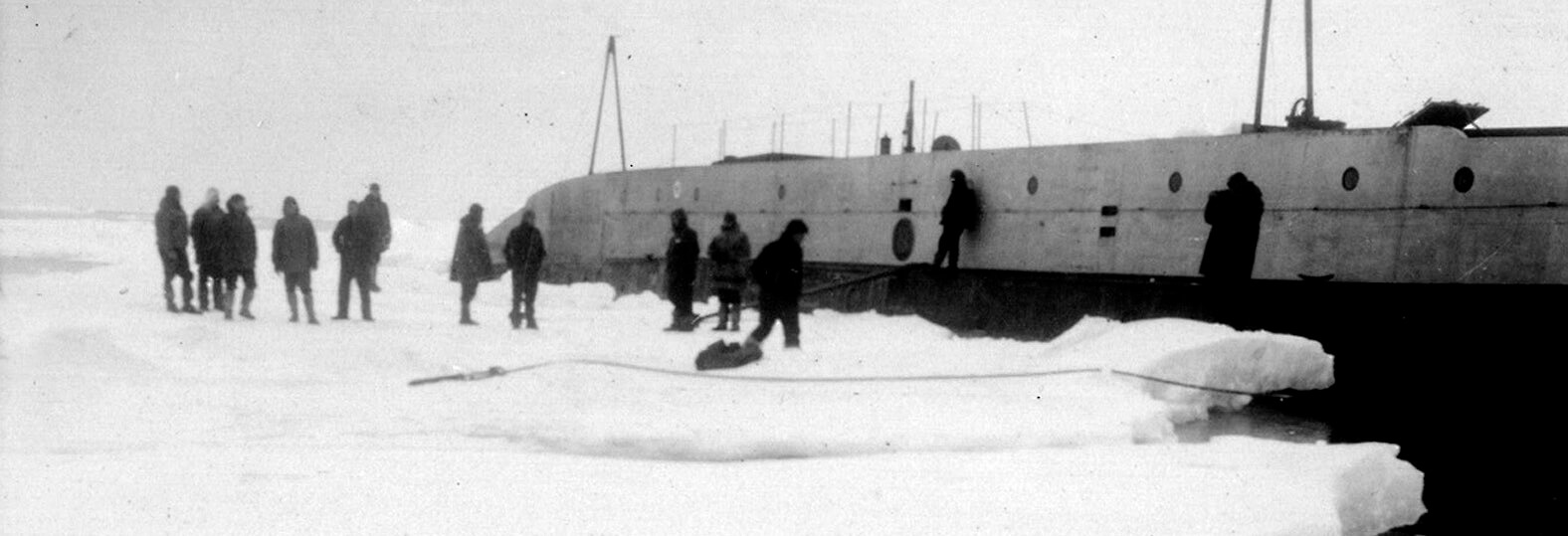 1931: The submarine Nautilus and crew on the Wilkins-Ellsworth Trans-Arctic Expedition